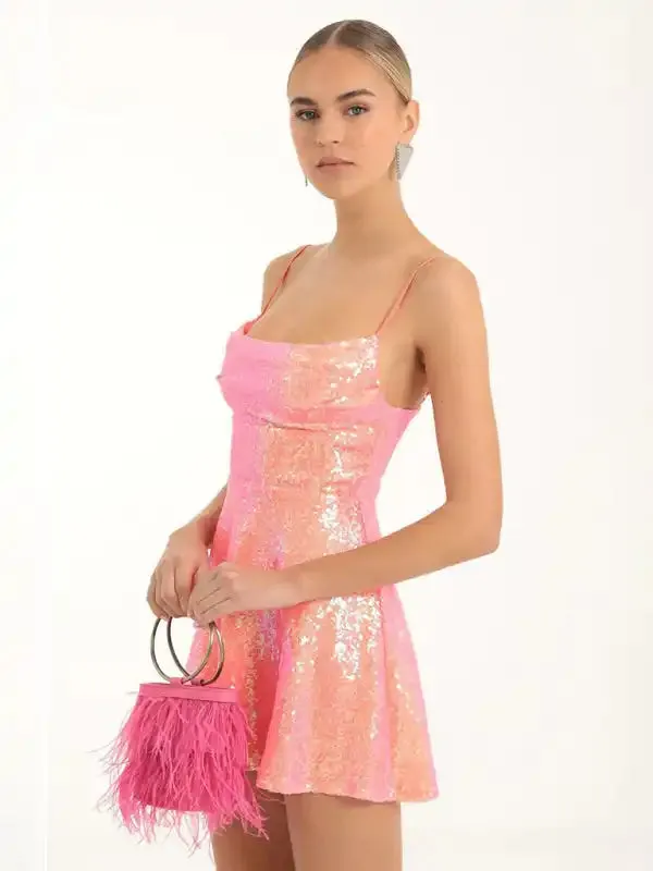 Fashionable and sexy suspender sequined bow contrast dress